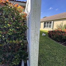 Professional-pressure-washing-of-gutters-lanai-vinyl-fence-and-pavers-for-residential-home-in-Boynton-Beach-FL-33436 17